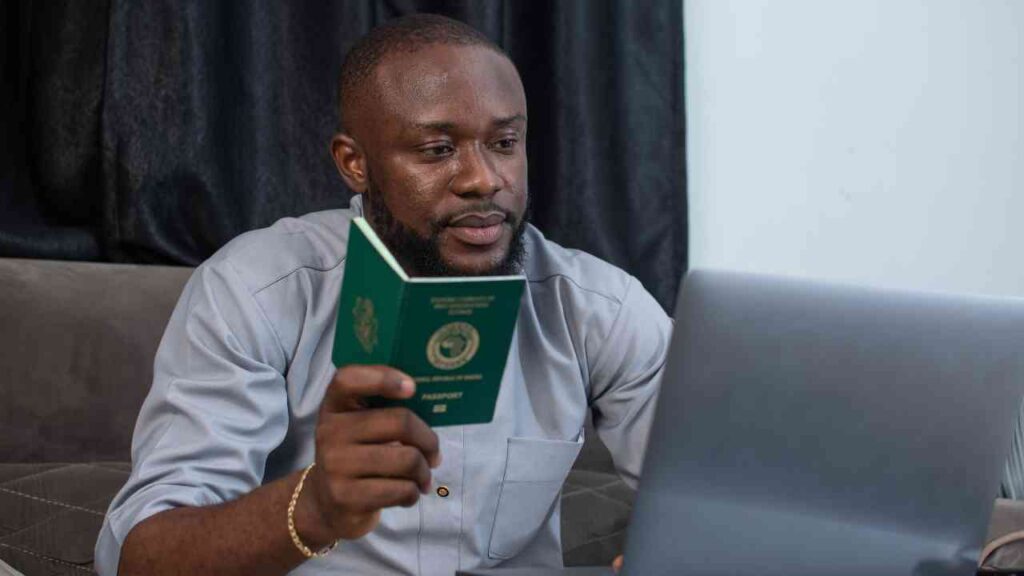 Man Reading How to Leave Nigeria Permanently
